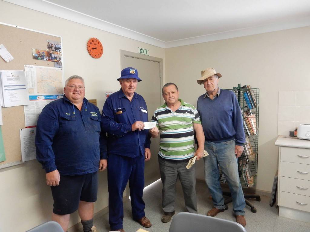 Cobar Buffalo Lodge representative Terry Clyde (second from right) presented a $500 donation to Copper City Men's Shed members Tony Punzet, Heinz Goldmann and Harry Cox last week. ▪ Photo contributed