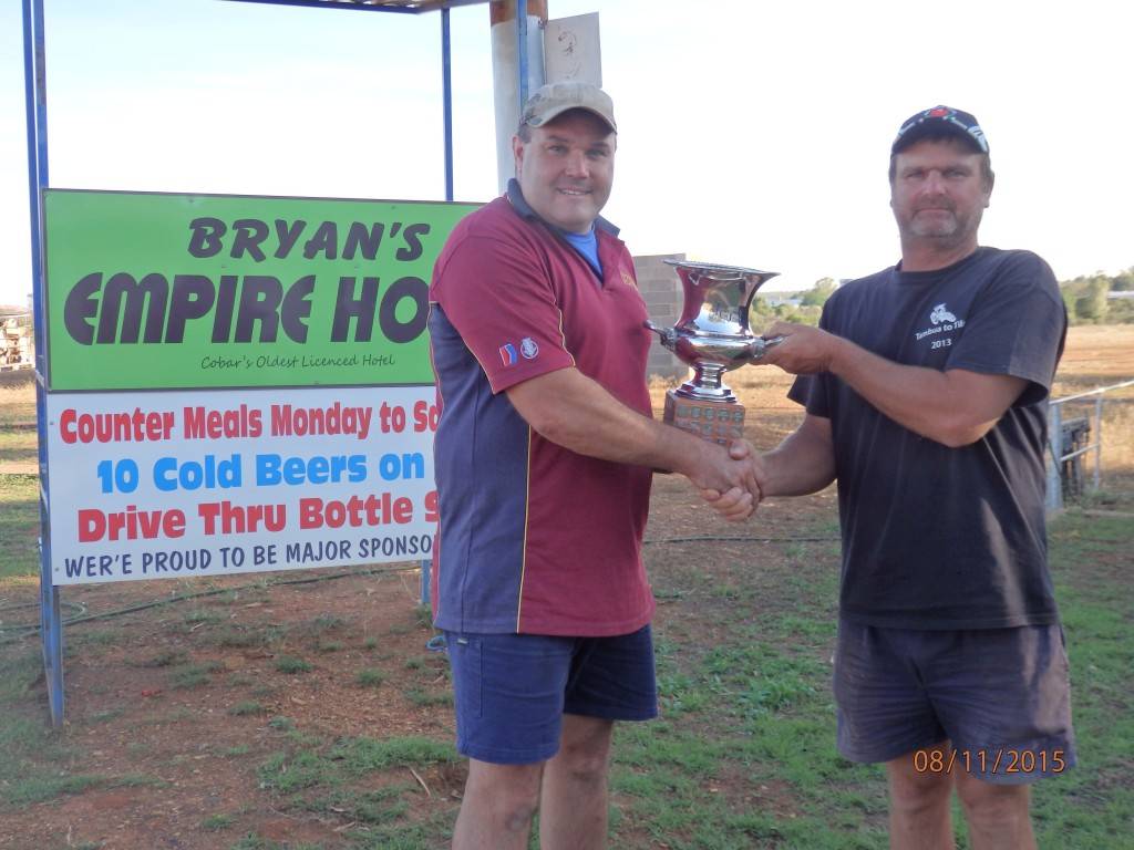 Bourke shooter Aaron Marsh claimed his second major Cobar Clay Target Club prize on Sunday winning the Billy Manns Memorial Trophy. Marsh is pictured with club president Bryan Manns. ▪ Photo contributed