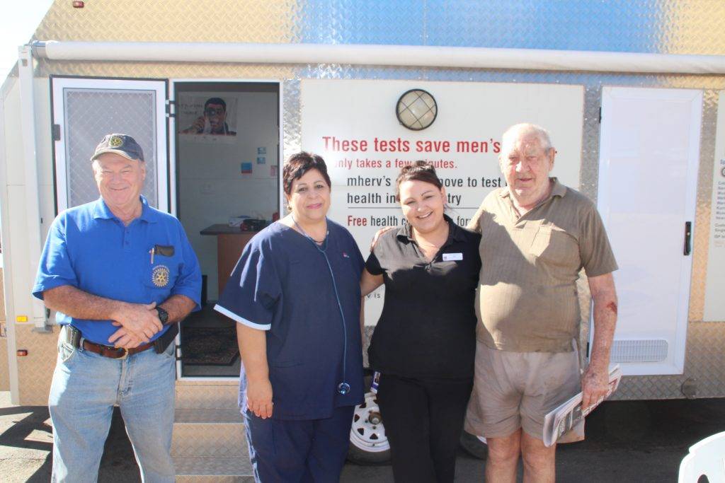 Rotary Club of Cobar member Gordon Hill with community health nurse Anna Dunlevy, cadet Aboriginal primary health care worker Stephanie McDonnell and Dennis Sloan at the MHERV men’s health van in Barton Street on Friday. 