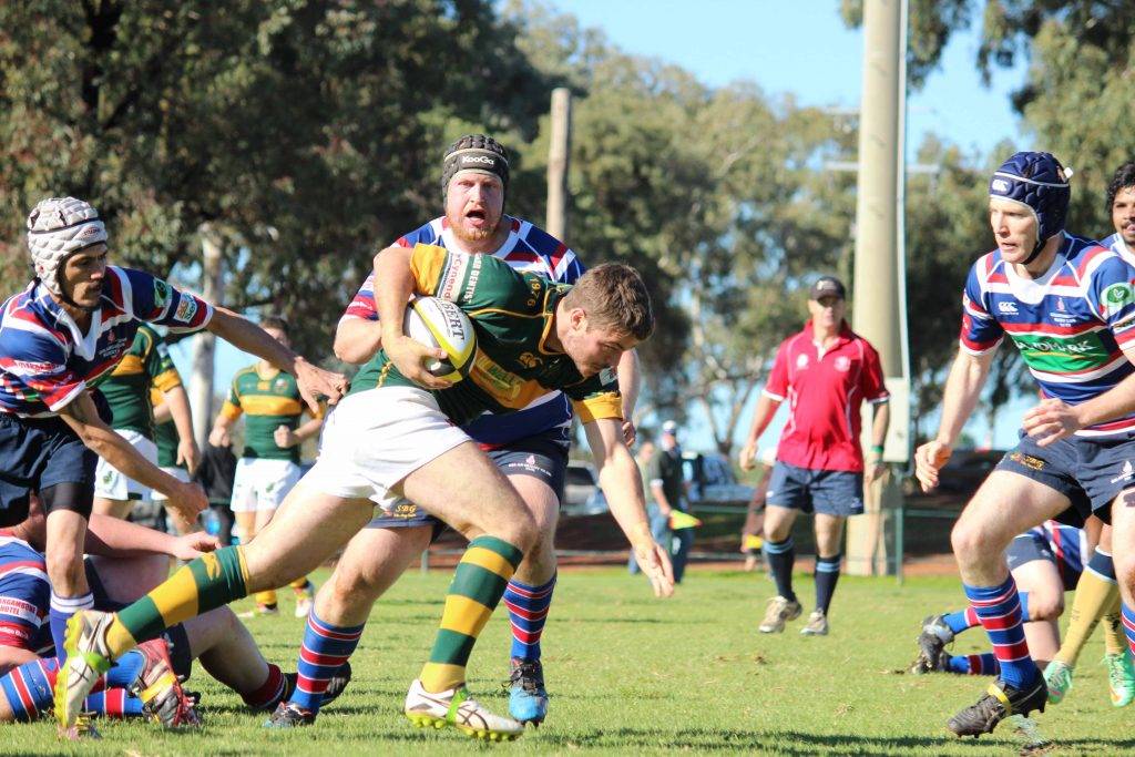 Tom Wall (with the ball) was one of the Camels’ best in their Western Plains Rugby match against Gulargambone on Saturday at Ailsa Fitzsimmons Memorial Oval.  ▪ Photo by Emily Carswell 