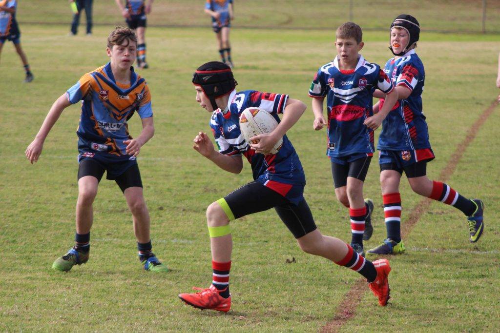 Riley Morley running the ball up for the Cobar juniors in their Under 13s game against South Dubbo at Tom Knight Memorial Oval on Saturday morning. 