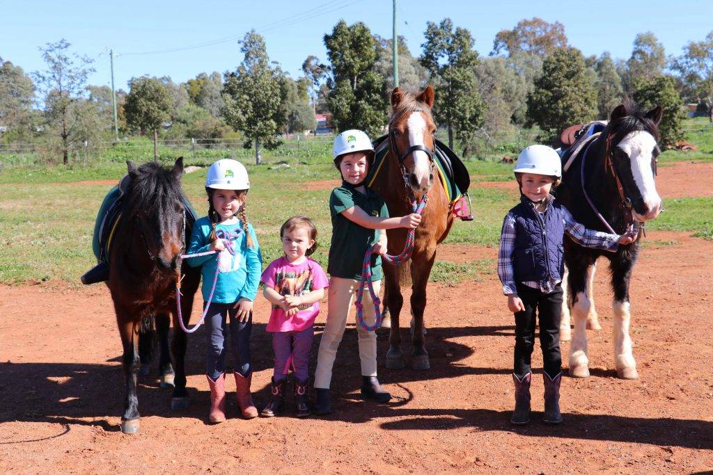 Lexi Ah-see with her horse Wilber, Ella and Lila Armstrong with Holly and Lara Stephens with her horse Boots at the Cobar Pony Club’s rally on Sunday at the  Dalton Park Horse Sports Complex. 