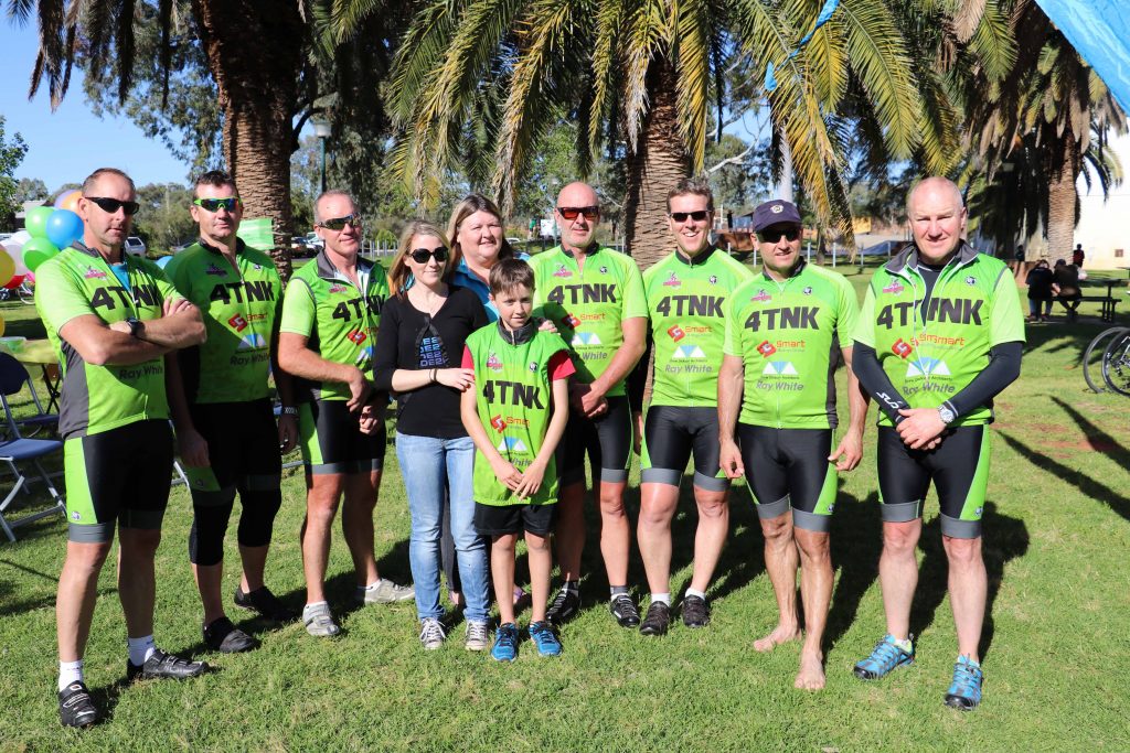 Ocean to Outback riders Dean Sohier, Andrew O’Shea, Trent Nicholson, Simon Twigg, Andrew Campbell, Gerardo Sanjurjo and Leigh Kiely with locals Bonnie Buckman, Narelle Kriz and Chad Buckman last Tuesday at Drummond Park. 