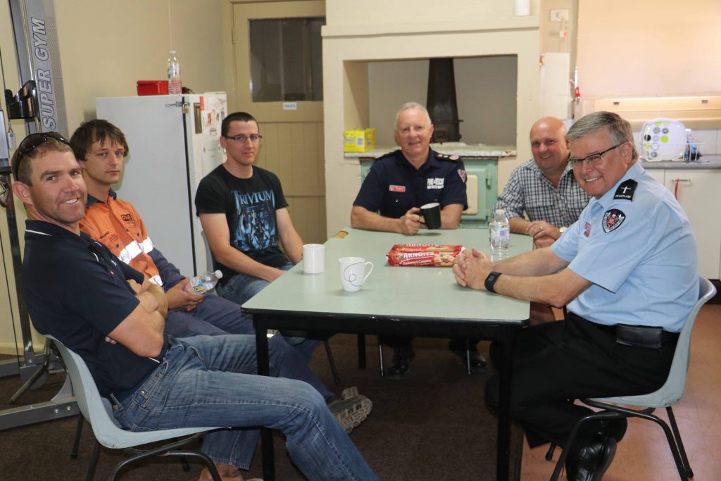 Commissioner Greg Mullins (centre) who retiring from a role where he has been on call 24/7 for the past 26 years of his career, called into the Cobar Station 256 yesterday on his farewell regional tour. He is pictured with local retained firefighters Aaron Davey, Tony Walkinshaw, Chris Freeman and Brad Lennon along with chaplain Lyndsay Smith. 